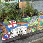 Dorking’s High Street blossoms with creativity: new artistic planters brightening up the town